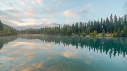 Cascade Pond in the morning with water reflection , Banff National park
