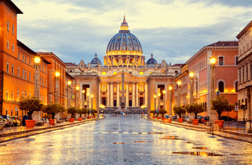St. Peter's Basilica in the evening from Via della Conciliazione in Rome. Vatican City Rome Italy. Rome architecture and landmark.  St. Peter's cathedral in Rome. Italian Renaissance church. - obrazy, fototapety, plakaty