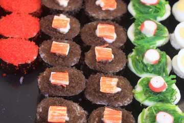 sushi on black background.