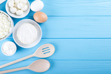  dairy products on blue wooden background