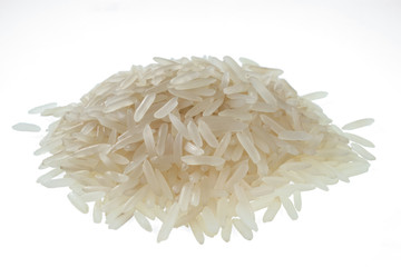 Handful of long-grain rice isolated on white background. One of the varieties of rice.