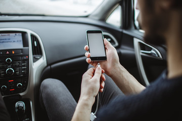 The men connected the charger to the phone.