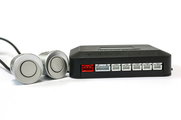 Two sensor and parking system unit on white background, Car accessories.