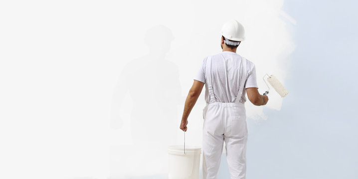 Rear View of Painter Man Looking at Blank Wall, with Paint Stick Stock  Image - Image of improvement, professional: 92914367