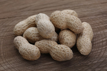 Peanuts  on wooden background