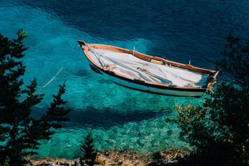 Blue waters of Foki Fiskardo Beach. Fiskardo, Kefalonia, Greece