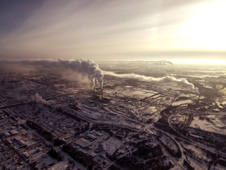 The cold winter sun illuminates the industrial district