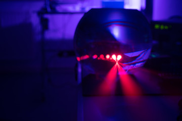 Experiment with red laser in optics lab