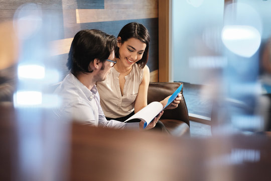 Business Man And Woman Meeting At Work In Office Cafeteria