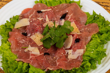 Beef carpaccio with parmesan cheese
