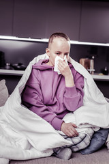 Sick female person suffering fever at home