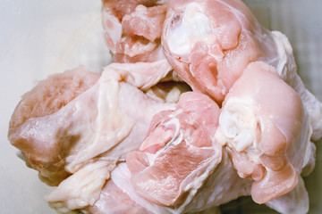 Raw chicken legs for cooking.