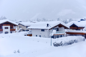 The winter ski chalet and cabin in snow mountain landscape in Austria, Europe.