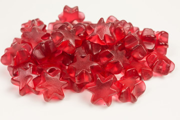 heap of star shaped gummy candy with mulled wine flavor