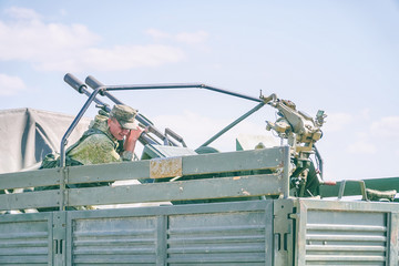 Double-barreled anti-aircraft gun in the back of car