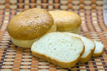 Hamburger bun in different positions on a beautiful background.