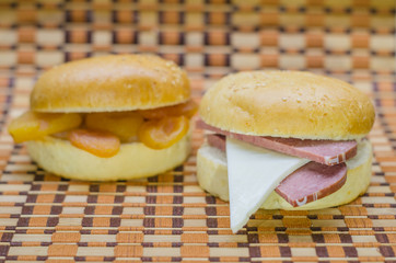 Hamburger bun in different positions on a beautiful background.