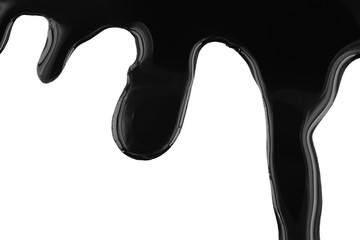 Dripping black paint isolated on white background. Flowing fuel oil splashes, drops and trail.