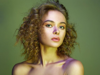 Beautiful woman in color Light. amazing curly girl