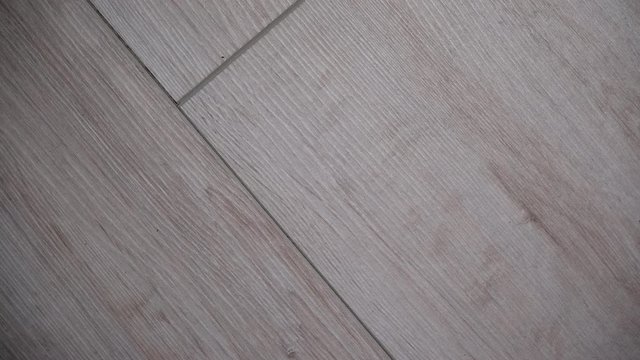 Textures and patterns concept. Detailed close up of bright wooden boards panel floor texture background
