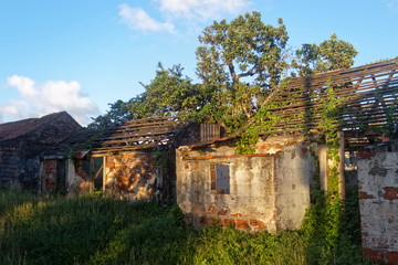 old ruined brick houses in La Poterie village, Les Trois-Ilets, Martinique FWI