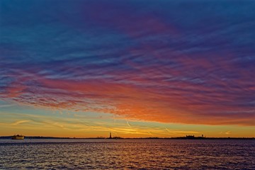 Fototapeta na wymiar Statue of Liberty at sunset