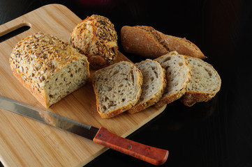 fresh variety bread on black background