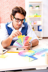 Young designer freelancer working on new project