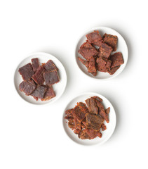 Beef jerky pieces.