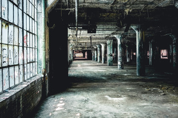 Interior view of the abandoned Fisher Body Plant factory in Detroit. The plant is abandoned and...