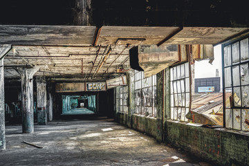 Interior view of the abandoned Fisher Body Plant factory in Detroit. The plant is abandoned and...