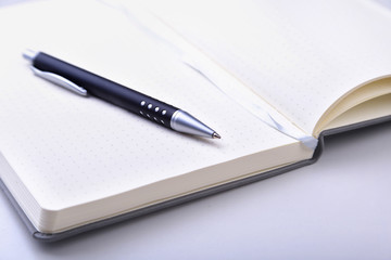 office table with notebook and pen. copy space.