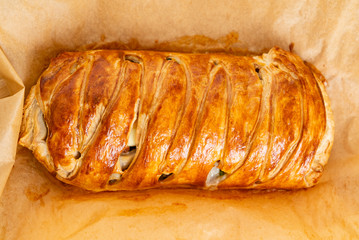 Spinach pie: Italian stromboli with eggs, spinach and mozzarella (Easter pastry)