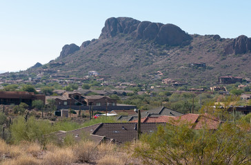 View of a residential area set against the mountains