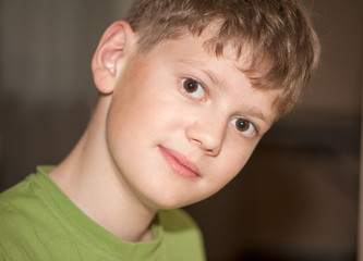 Portrait of a boy in a light green t-shirt
