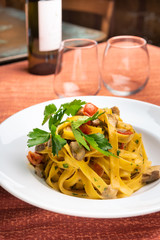 fettuccine with porcini mushrooms and Pagnino tomatoes
