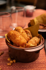 potato croquettes in terracotta bowl