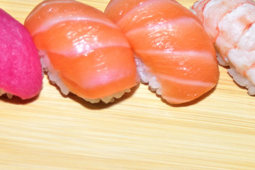 close up of sashimi sushi set with chopsticks and soy