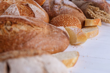 Freshly Baked Homemade Bread, close-up, isolated on a white background.