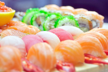 close up of sashimi sushi set with chopsticks and soy