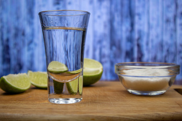 White tequila shot with lime and salt