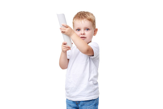 Small blond boy in white clothes holding  TV remote control on white isolated background