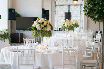 restaurant terrace prepared for a wedding dinner