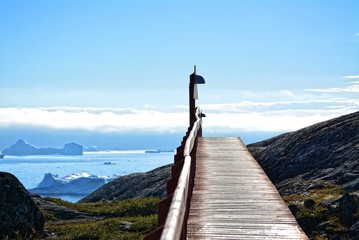 Ilulissat, Greenland, July | midnight sun | impressions of Jakobshavn | wooden footbridge in the...