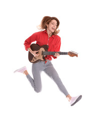 Young woman playing electric guitar on white background