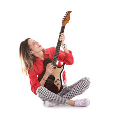 Fototapeta premium Young woman playing electric guitar on white background