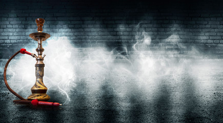 Hookah smoking on the background of a brick wall, neon light, smoke, smog