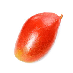 Delicious ripe mango on white background. Tropical fruit