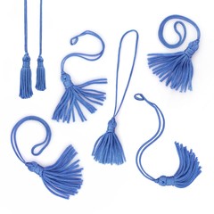 Set of blue tassels isolated on white background