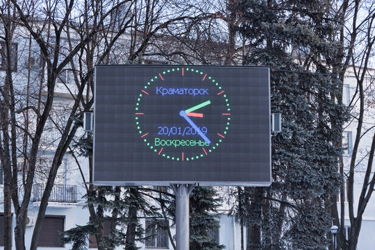 Electronic clock at the central square of the Ukrainian Kramatorsk, winter